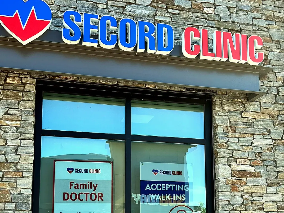 Secord Clinic exterior signage reading Family Doctor and Accepting Walk-Ins in the Secord community of West Edmonton