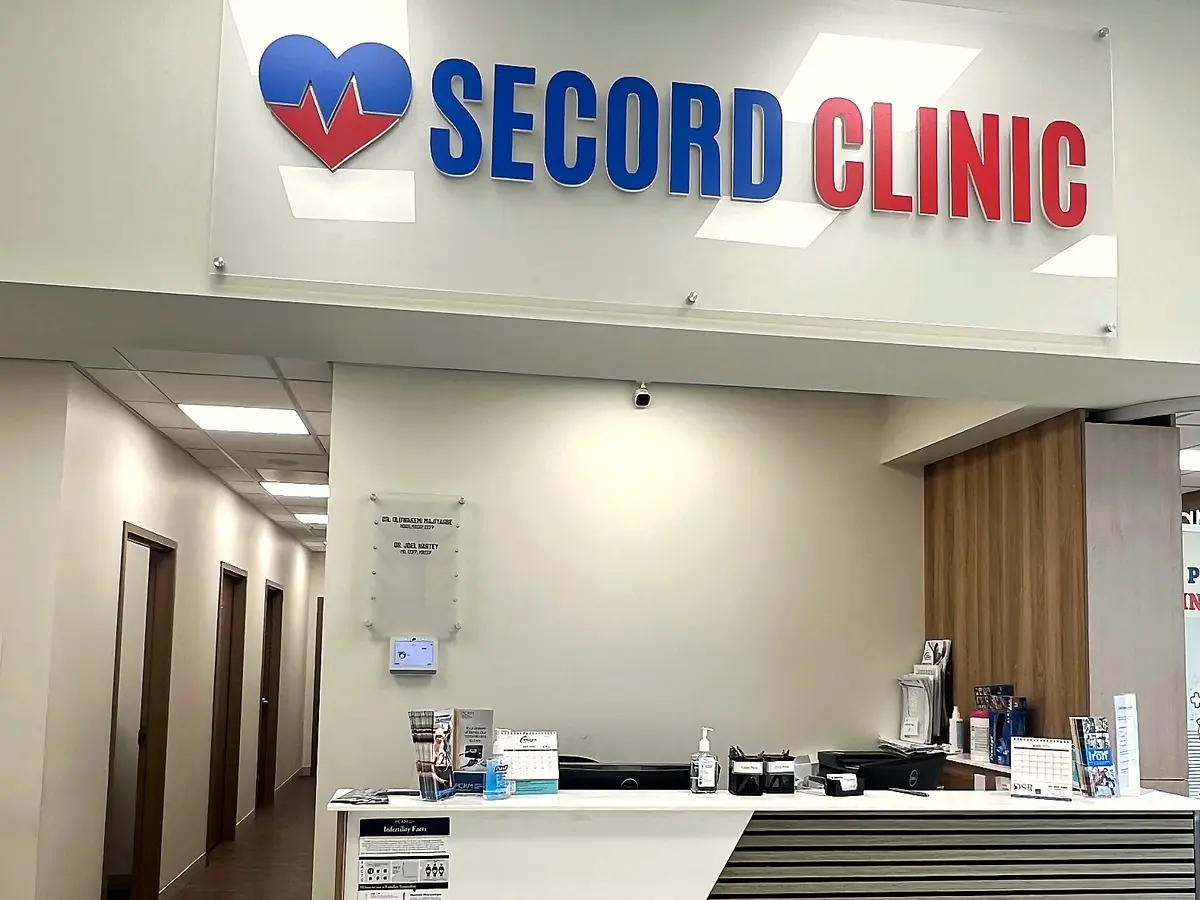 Secord Clinic reception desk and hallway with exam rooms